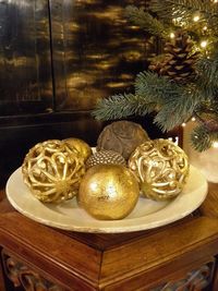 Decorative vintage baubles on an antique French plate