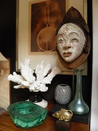 Punu mask, Malachite bowl, Man Ray print