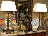 French Console DIRECTOIRE with huge Imari plate, a Tibetan Silver vessel, a FANG head and a pair of antique French altar candlesticks